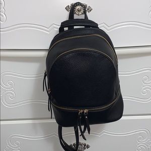Black backpack with matching wallet